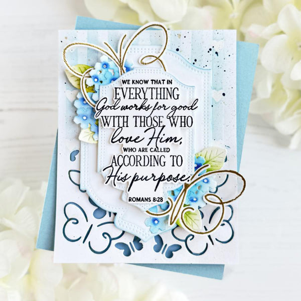Decorative card with floral designs and a Bible verse on a light background