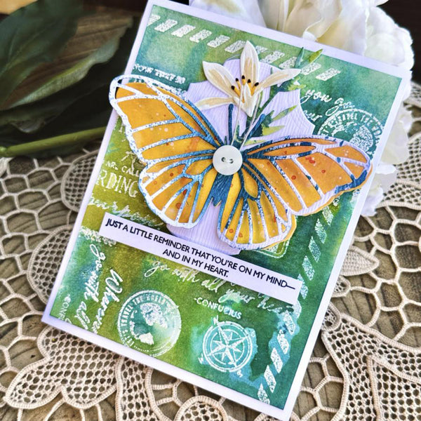 Card with butterfly design on a textured surface