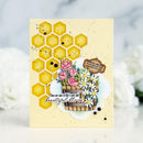 Greeting card with floral design and honeycomb pattern on a light background