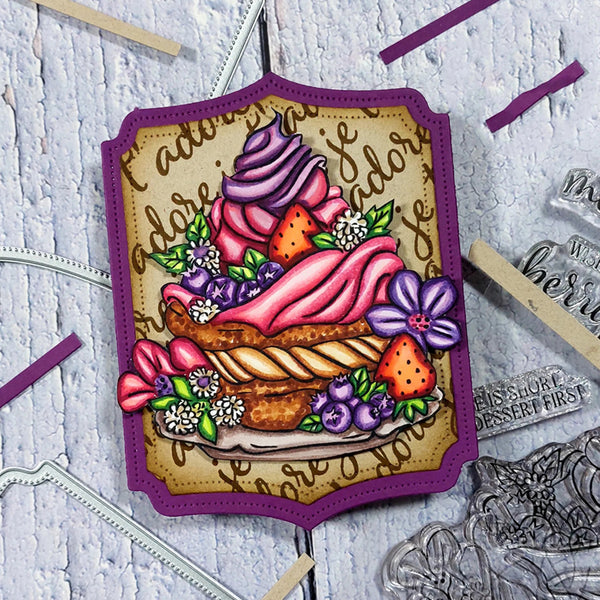 Colorful cake illustration on a decorative background with metal dies.