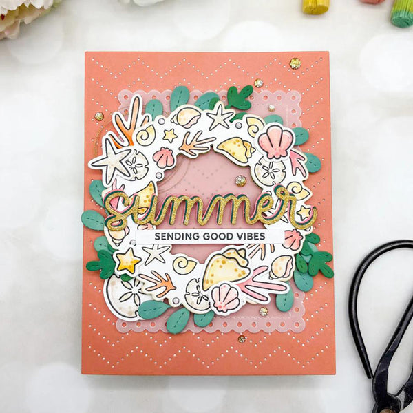 Handmade card with 'Summer Sending Good Vibes' text on a pink background, surrounded by decorative elements.
