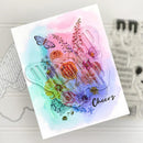 Colorful card with floral design and 'Cheers' text on a light background