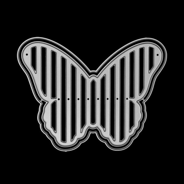 Butterfly-shaped metal grille on a black background
