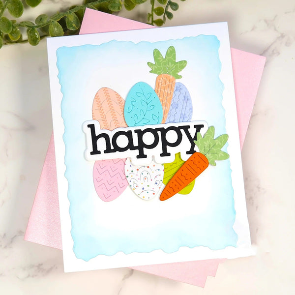 Colorful card with 'happy' text and Easter-themed illustrations on a marble surface.