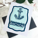 Card with an anchor design on a white background