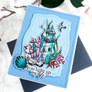 Card with a lighthouse design and text 'You light up my life' on a light blue background.