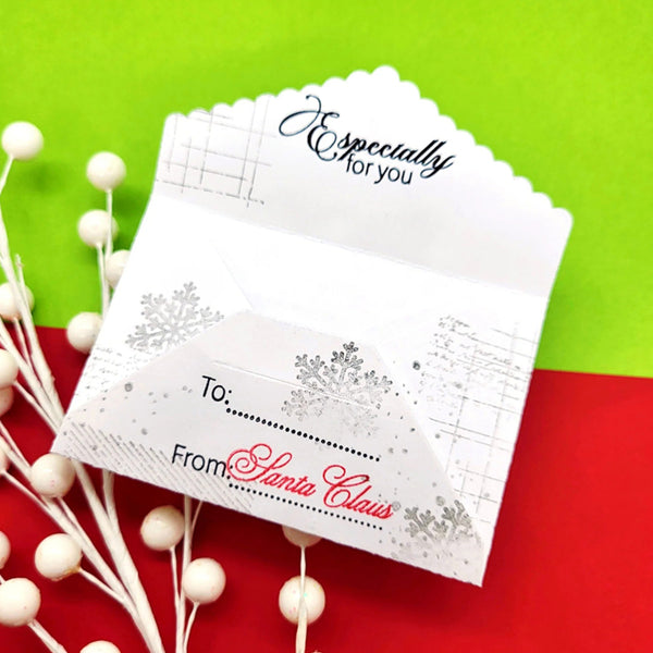 Set of personalized Christmas gift tags on a red and green background with decorative elements.