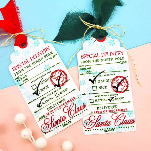 Two Christmas gift tags with Santa Claus text on a colorful background