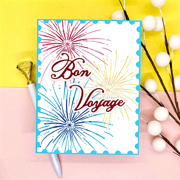 Card with 'Bon Voyage' text and colorful fireworks design on a yellow and pink background.