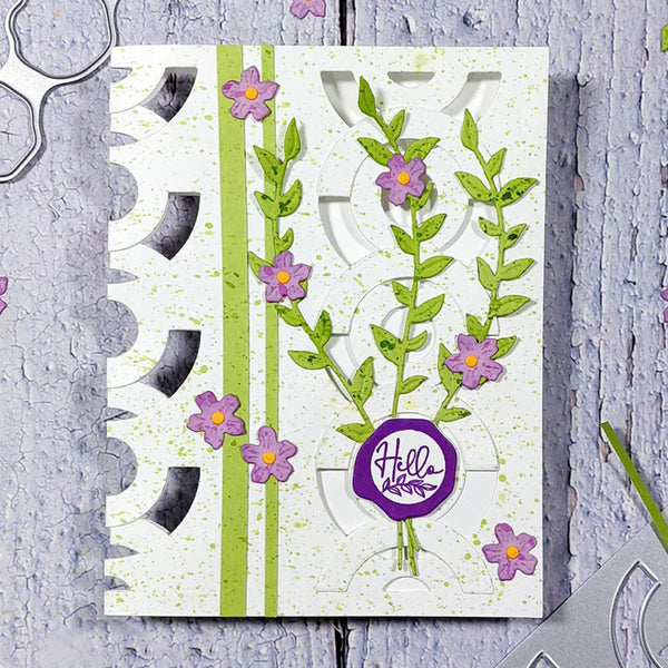 Card with floral design and 'Helle' stamp on a textured surface