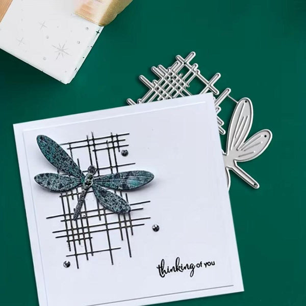 Card with dragonfly design and 'thinking of you' text on a green background