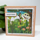 Card with a cartoon frog and 'hang in there' message on a white background