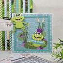 Card with two green frogs on a lily pad, surrounded by greenery