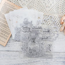 Decorative clear stamp set with floral design and text on a textured surface