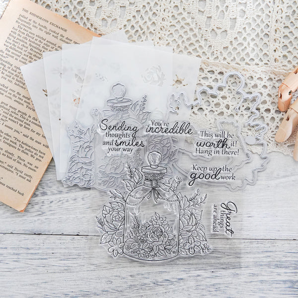 Decorative clear stamp set with floral design and text on a textured surface