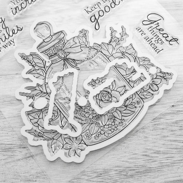 Decorative bottle with floral elements on a wooden surface
