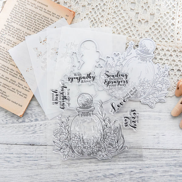 Clear stamp set with floral and bottle designs on a textured surface