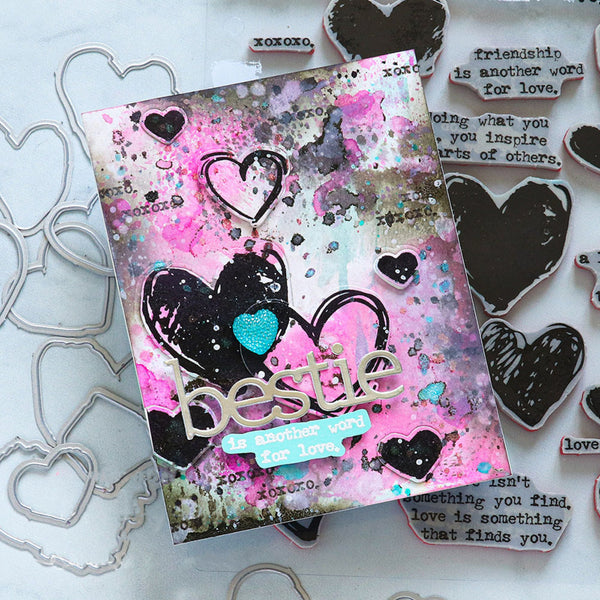 Decorative card with heart designs and the word 'bestie' on a white background with heart-shaped objects.