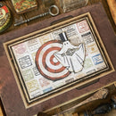 Vintage-style card with a ghost design on a wooden surface with tools.