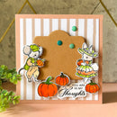Greeting card with cartoon mouse and rabbit characters, pumpkins, and text on a striped background.