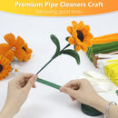 Person holding a green pipe cleaner with sunflower decorations on a white background, featuring text about premium pipe cleaners.