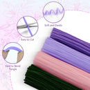 Purple, pink, and green elastic bands with close-up details on a floral background