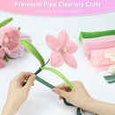 Hands holding a green pipe cleaner with pink flowers on a white background, featuring text about premium pipe cleaners craft.