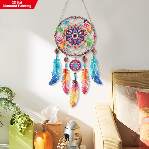 Colorful dreamcatcher hanging on a wall above a bed with decor items.