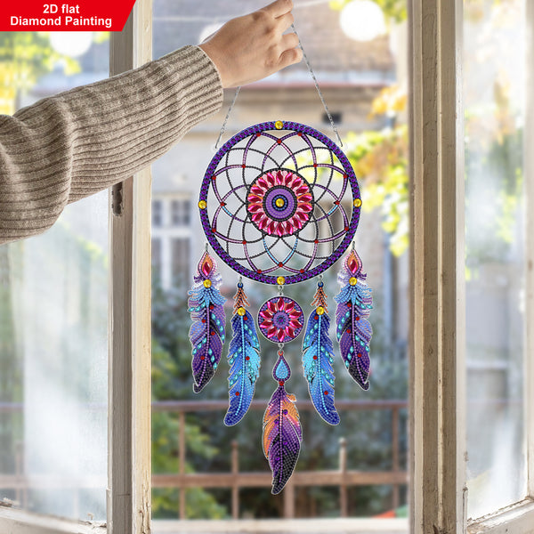 Colorful dreamcatcher decoration hanging by a window