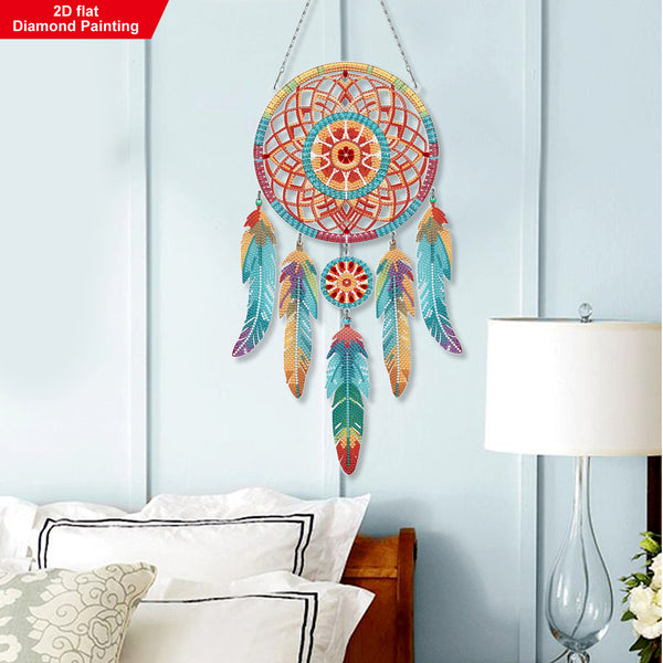 Colorful dreamcatcher wall art in a bedroom setting with a lamp and pillows.