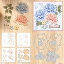 Set of floral cutting dies and stencils on a wooden surface with a motivational card.