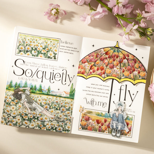 Two illustrated cards on a light surface with flowers around, featuring text and images of people in nature.