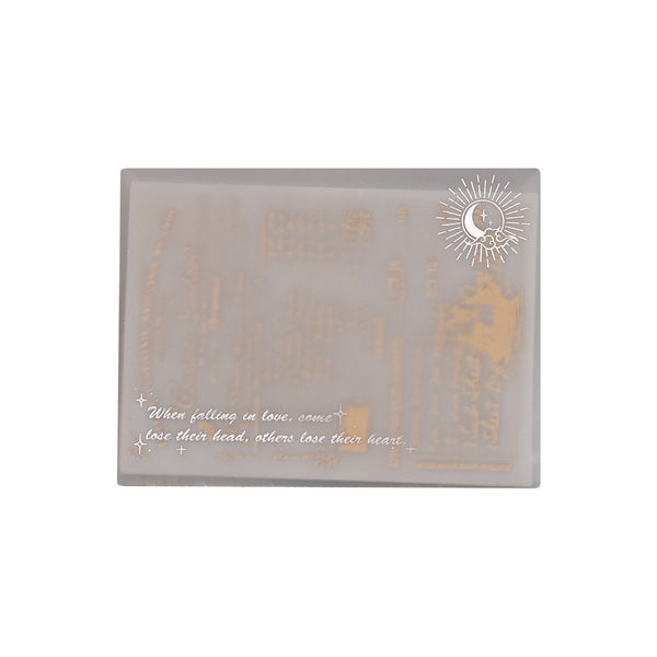 Decorative rectangular plate with gold text and design on a white background