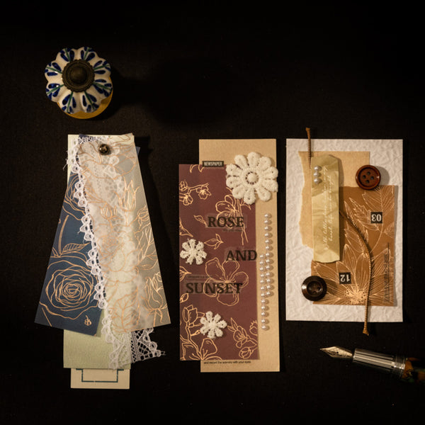 Collection of decorative bookmarks with floral designs on a dark background