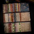 Set of fabric swatches with various patterns and colors on a dark background