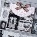 Lace Academy product with lace patterns and a bow on a gray background