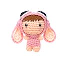 Crocheted doll with pink bunny ears and a black and white striped hat on a white background
