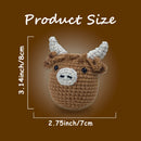 Crocheted animal head with measurements on a brown background