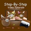 Crocheted animal head toys with a laptop showing step-by-step video tutorials on a brown background.