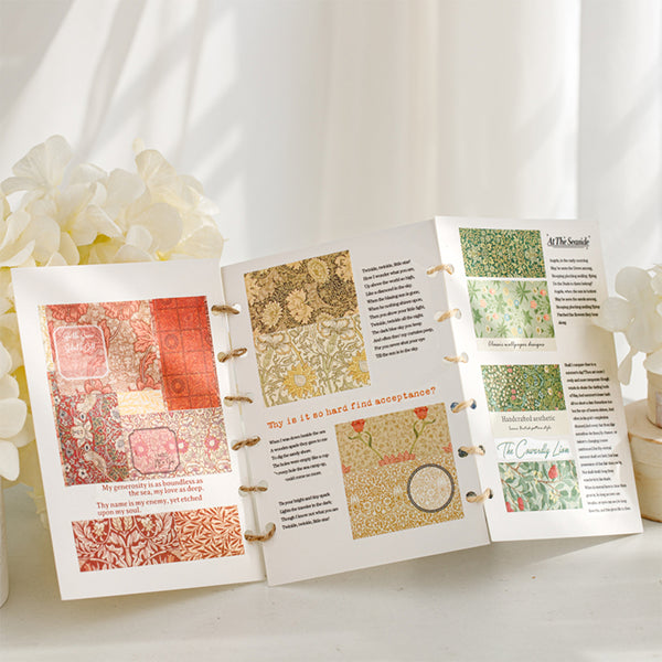 Open book with patterned pages on a white surface