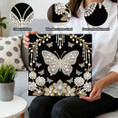 Person holding a decorative panel with a butterfly design, pearls, and flowers, with close-ups of clear printing, wooden frame shed, and pearl embellishment issues.