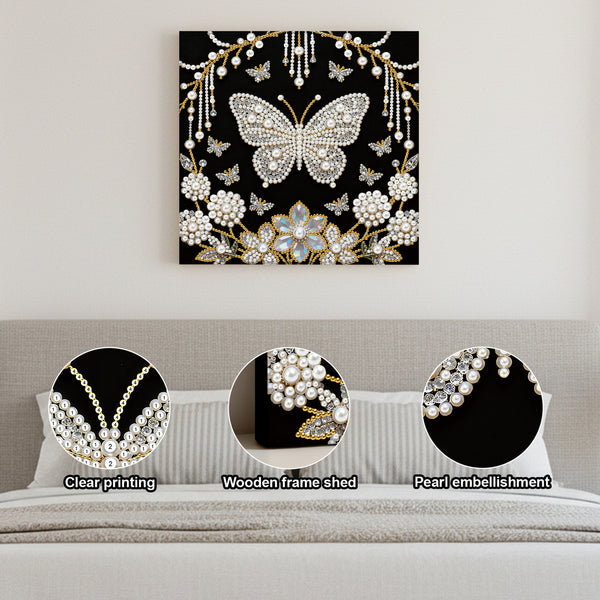 Decorative wall art with butterfly and floral design on a black background, displayed above a sofa.