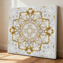 Decorative wall art with pearl and gold design on a white background