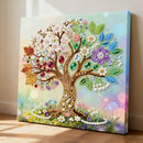 Decorative wall art of a tree with colorful beads and gemstones on a light background.