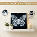 Decorative butterfly art piece on a shelf with plants and a candle, emphasizing compactness and versatility.