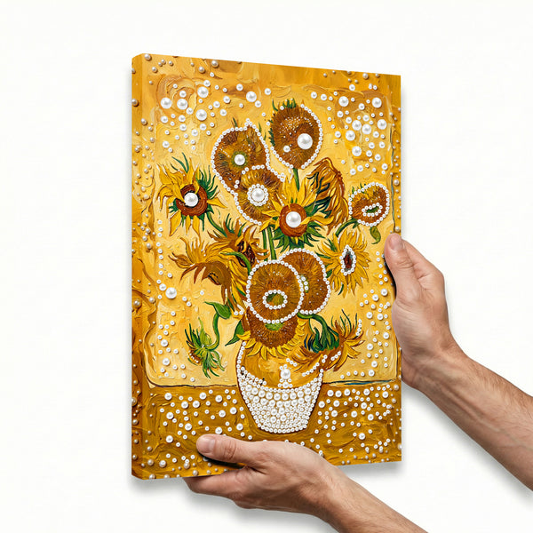 Decorative notebook with sunflower design held by a hand on a white background
