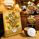 Decorative pearl painting of sunflowers on a table with a cup of coffee, surrounded by close-up images of pearls.