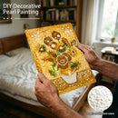 Person holding a decorative pearl painting of a deer and sunflowers in a bedroom setting.