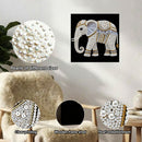 Decorative elephant with pearl embellishments on a white background