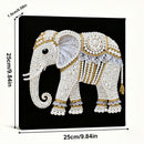 Decorative elephant with pearls and gold accents on a black background, with measurements indicated.